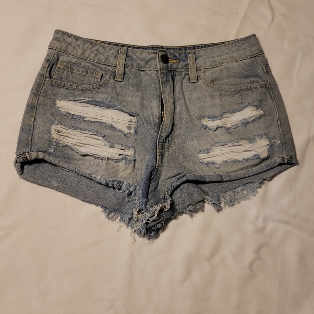 Forever 21 high rise ripped jean shorts.